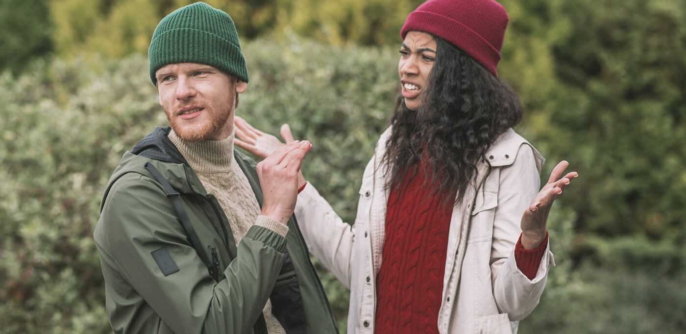 Couple arguing outside