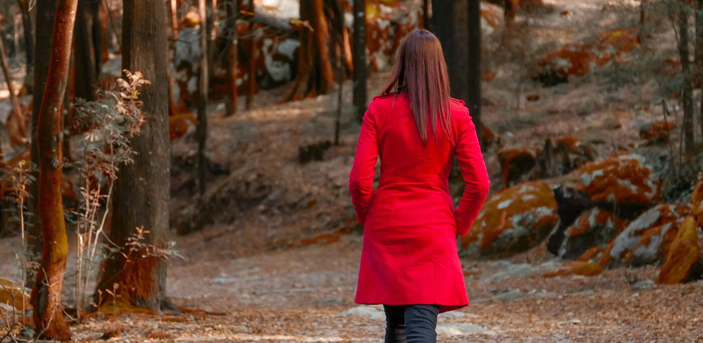 Women in red leaving