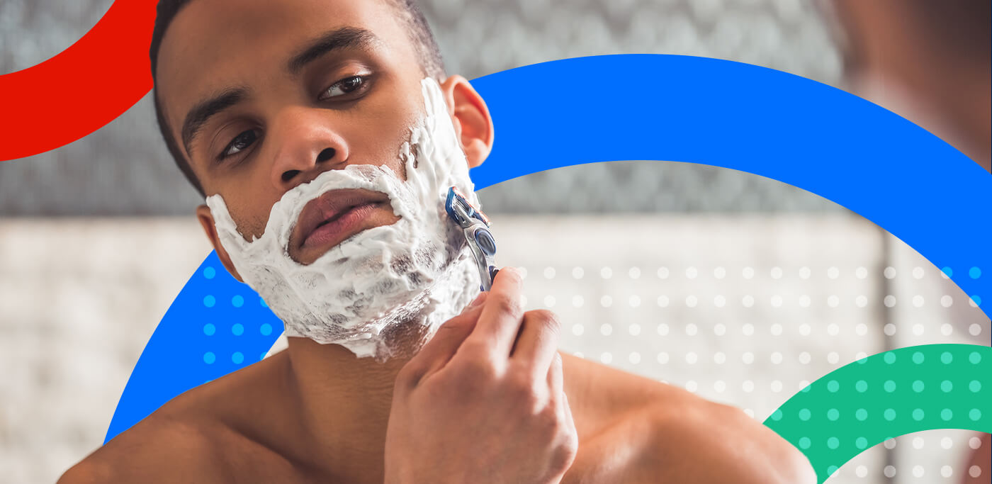 Man shaving in the mirror