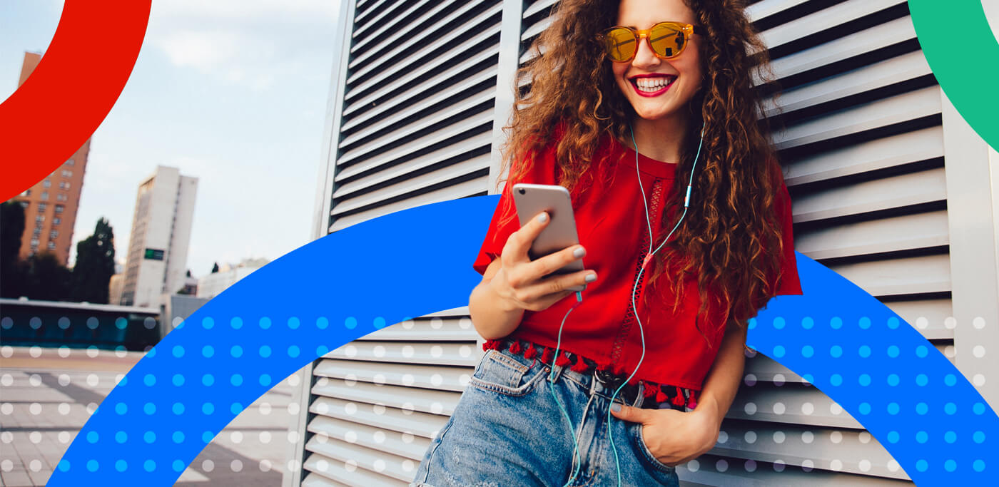 Trendy women reading on mobile phone