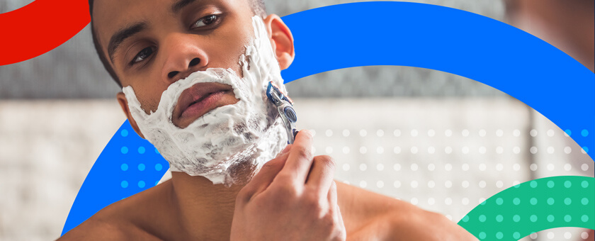 Man shaving in the mirror