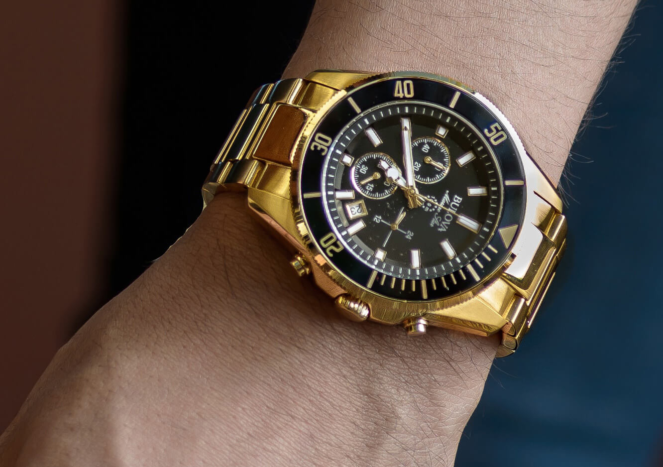Gold and black watch